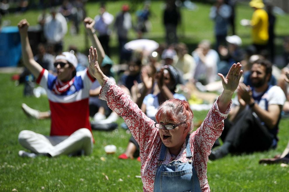 PHOTO: Soccer fans cheer as the U.S. Women's Soccer team scores a goal against Sweden during the Women's World Cup at a public watch party on June 20, 2019 in San Francisco, Calif.