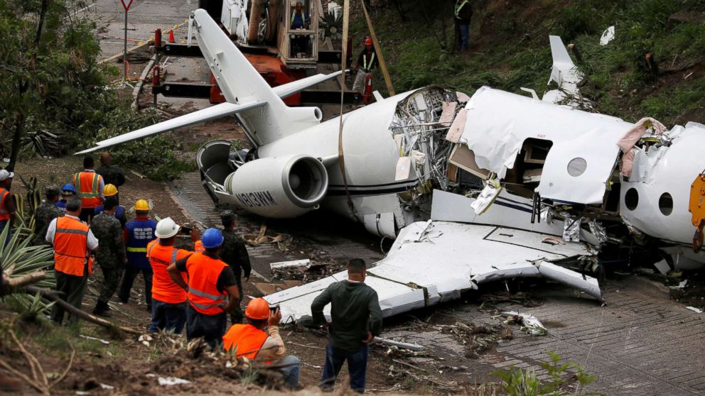 All 6 aboard jet escape wreckage after it skids off runway in