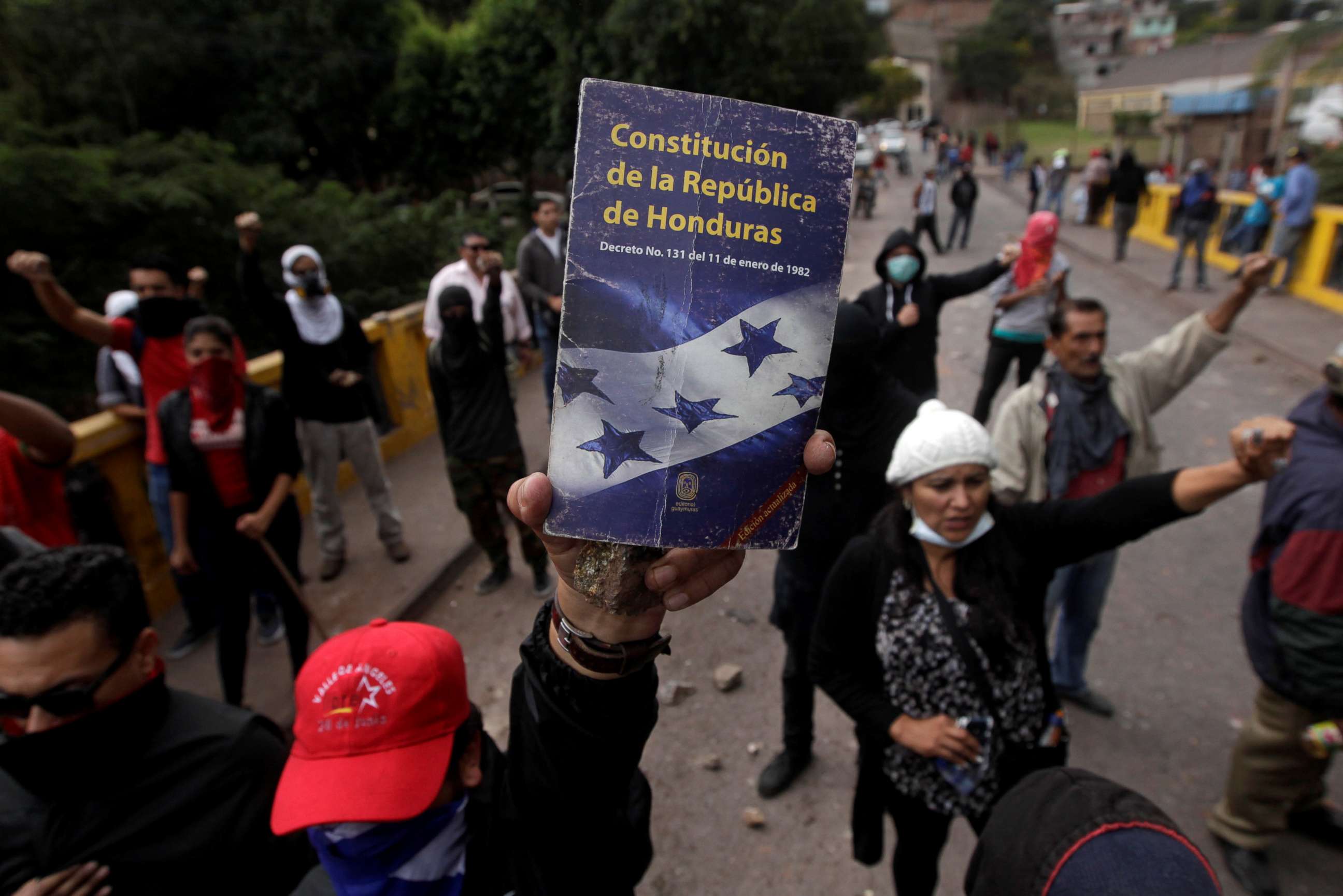 PHOTO: An opposition supporter holds up the Constitution of the Republic of Honduras during a protest over a contested presidential election with allegations of electoral fraud in Tegucigalpa, Honduras, Dec. 22, 2017. 