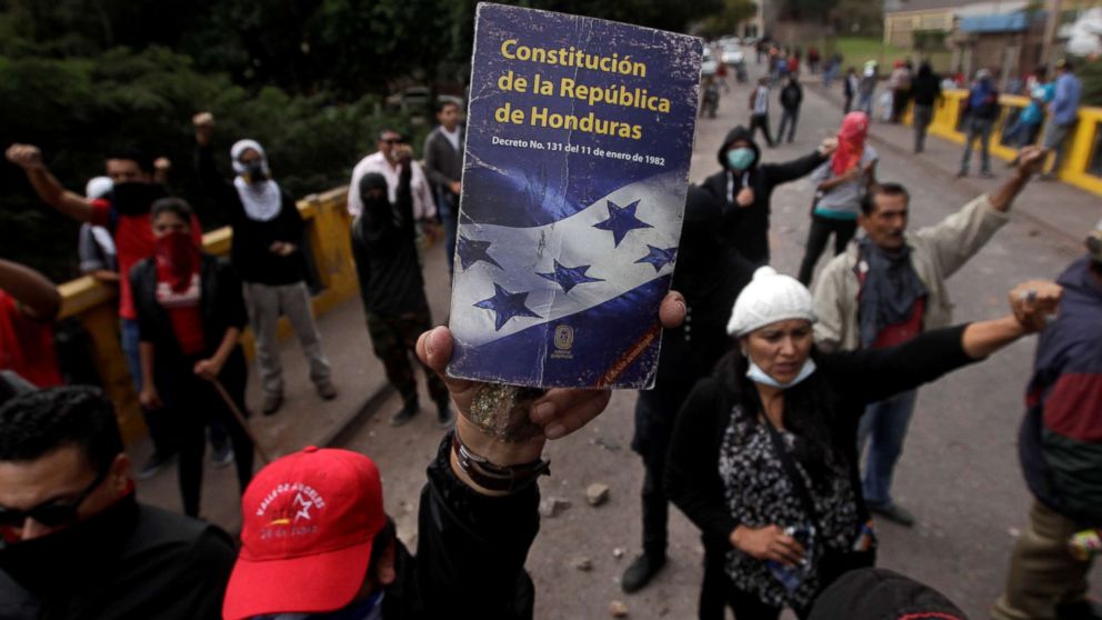 PHOTO: An opposition supporter holds up the Constitution of the Republic of Honduras during a protest over a contested presidential election with allegations of electoral fraud in Tegucigalpa, Honduras, Dec. 22, 2017.