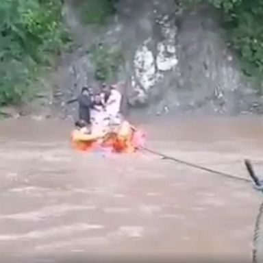 Firefighters helped save several people, including an infant, from flooding caused by the tropical storm. 