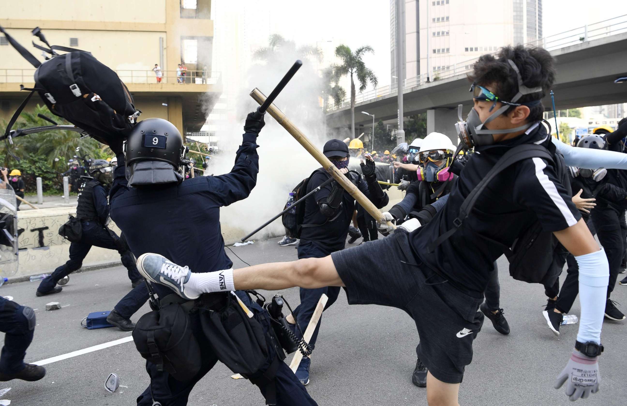 PHOTO: Police and protesters clash in Hong Kong's Kowloon area on Aug. 24, 2019.