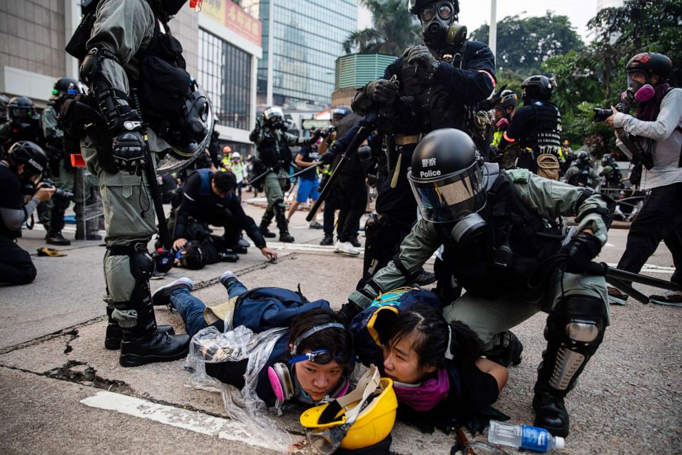 PHOTO: Riot police detain demonstrators during a protest in the Admiralty district of Hong Kong, Sept. 29, 2019.