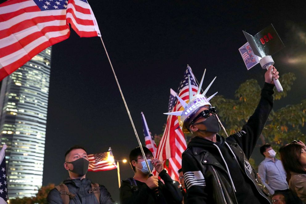 PHOTO: Demonstrators holding U.S. flags attend a rally in Hong Kong, Nov. 28, 2019. 