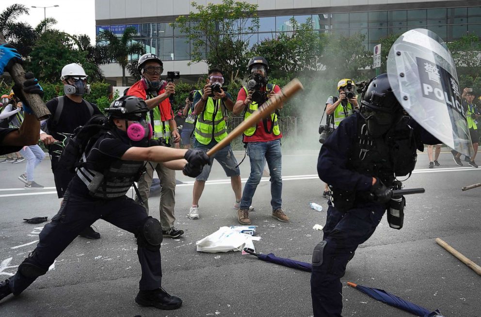 PHOTO: Police and demonstrators clash during a protest in Hong Kong, Saturday, Aug. 24, 2019.