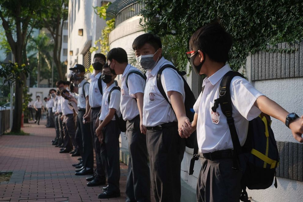 PHOTO: Secondary school students form a human chain in Hong Kong, Sept 9, 2019, in support of anti-government protests.