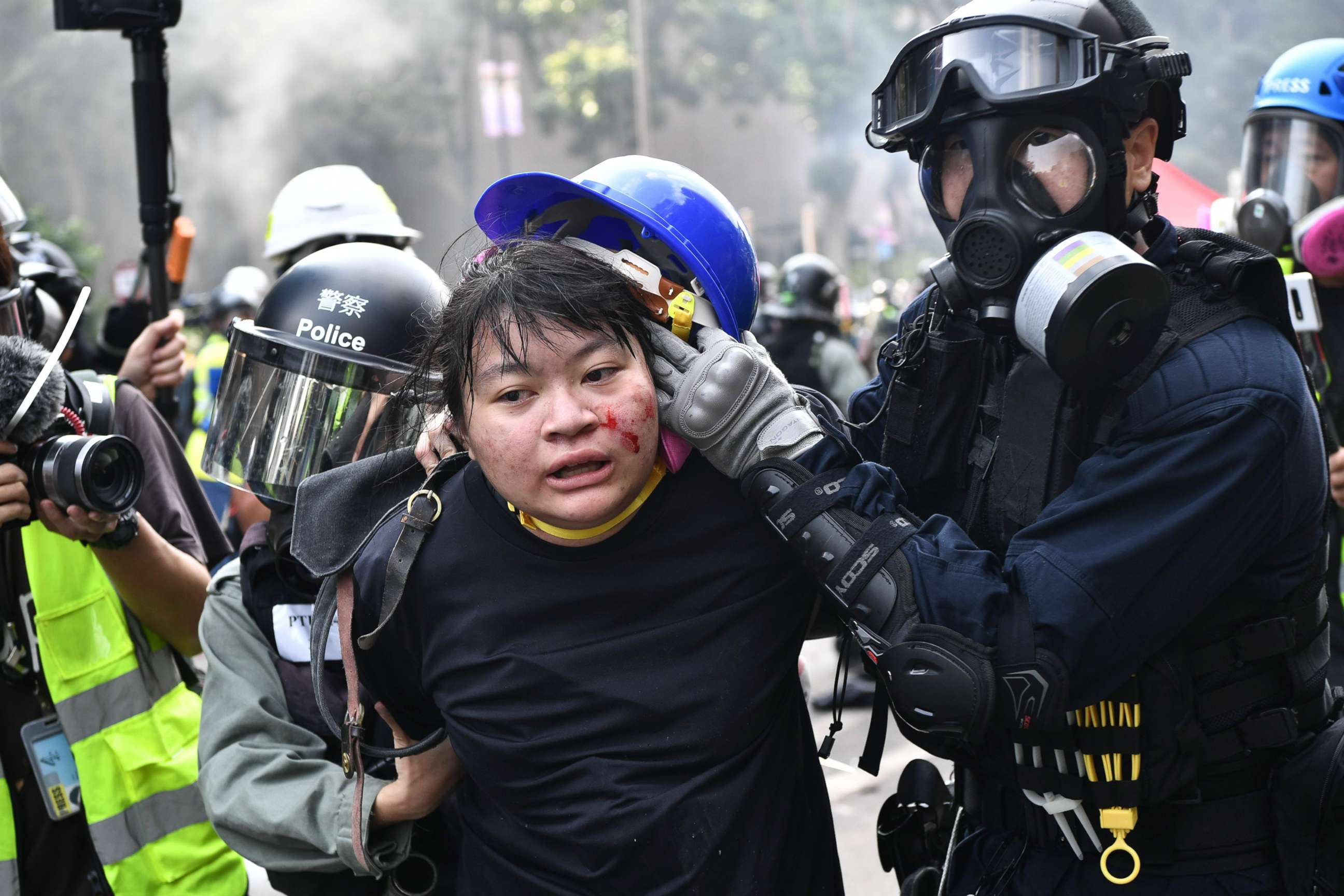 PHOTO: Protesters are detained by police near the Hong Kong Polytechnic University in Hung Hom district of Hong Kong on Nov. 18, 2019.