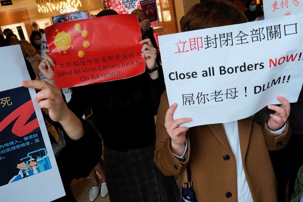 PHOTO: Supporters of medical workers hold a flash mob protest in Hong Kong to back their strike demanding that the semi-autonomous city close its border with mainland China to reduce the spread of the novel coronavirus, Feb. 3, 2020.