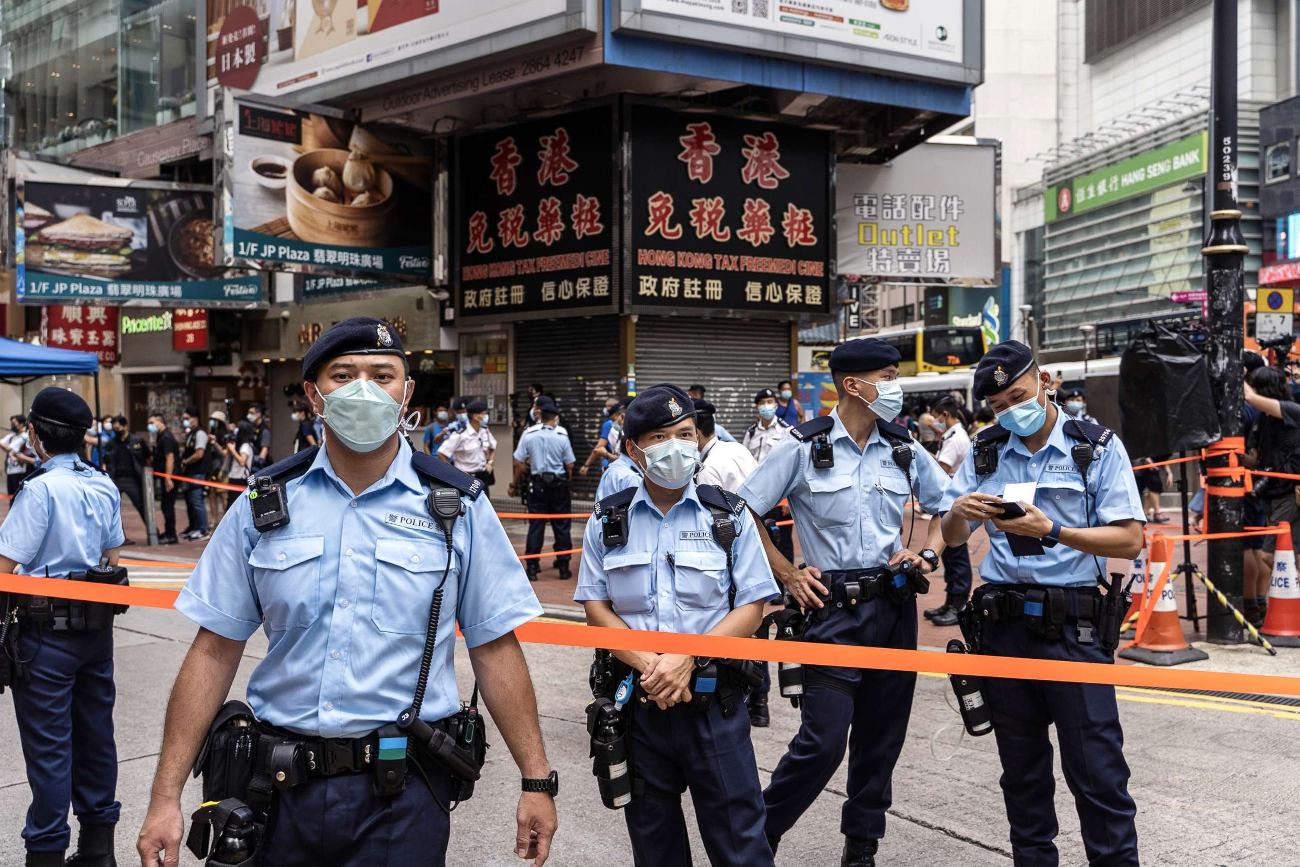 PHOTO: Police officers stand guard in the Causeway Bay area of Hong Kong, China, on July 1, 2021.