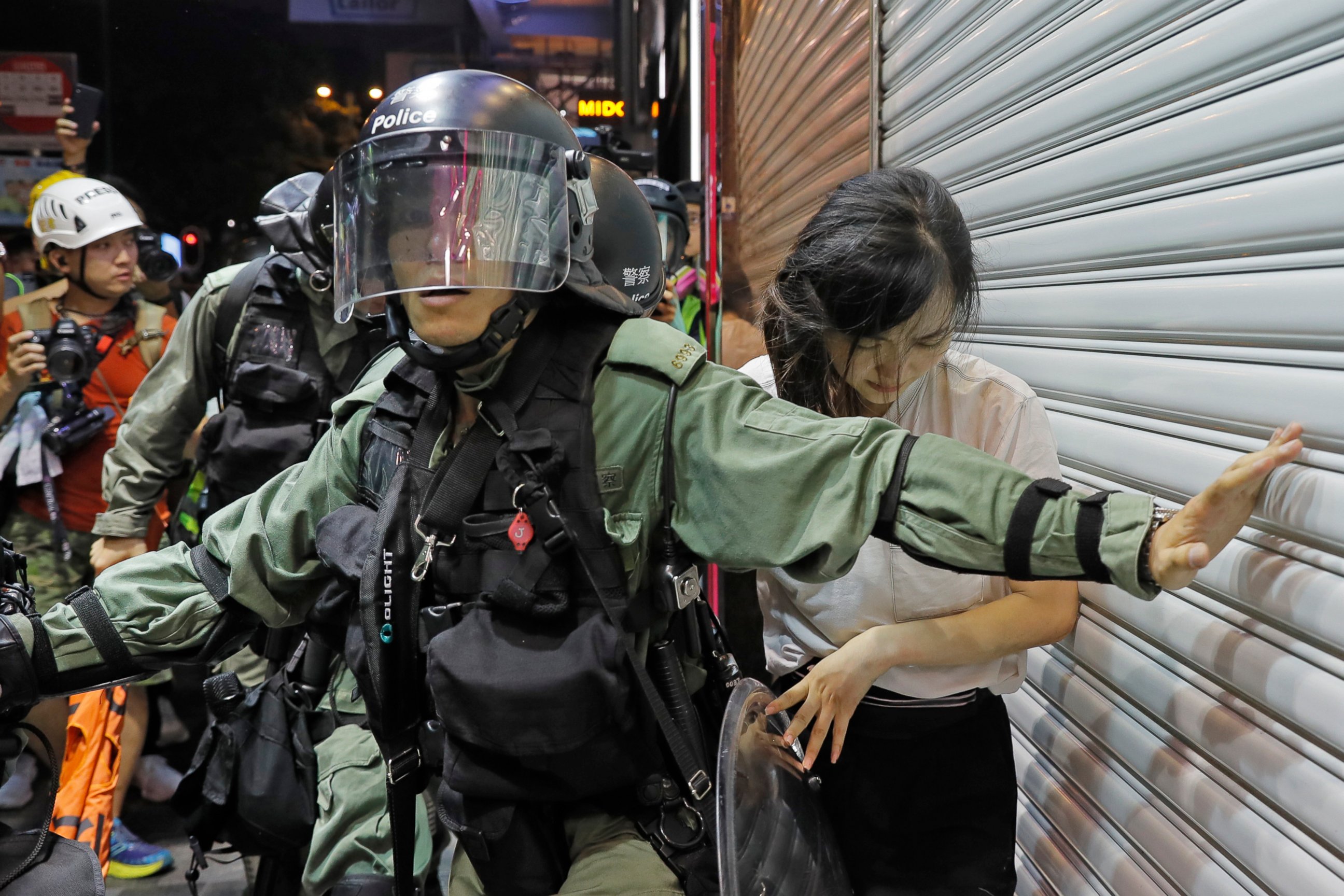 PHOTO: Police detain a girl during a confrontation in Hong Kong on Saturday, Aug. 10, 2019.