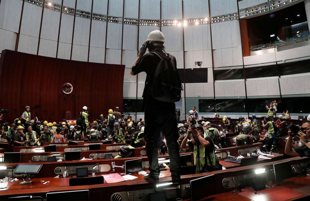 PHOTO: Protesters are seen inside a chamber after they broke into the Legislative Council building during the anniversary of Hong Kong's handover to China in Hong Kong, July 1, 2019.