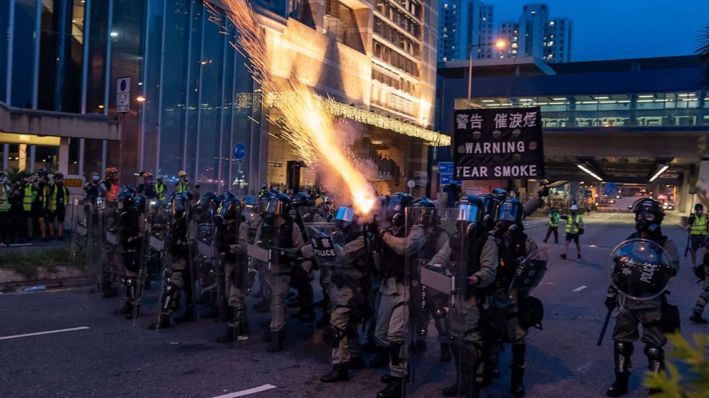 PHOTO: Riot police fire tear gas during a clearing at a demonstration in Tai Wan on Saturday, Aug. 10, 2019 in Hong Kong.