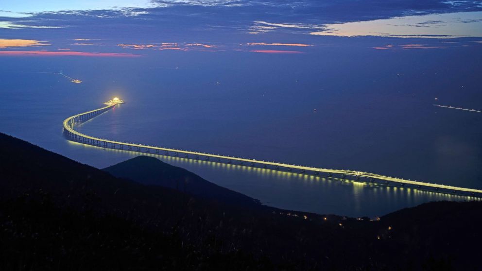 PHOTO: The Hong Kong-Zhuhai-Macau Bridge is lit up in Hong Kong, Oct. 21, 2018. The bridge, the world's longest cross-sea project, which has a total length of 34 miles, will have opening ceremony in Zhuhai on Oct. 23.