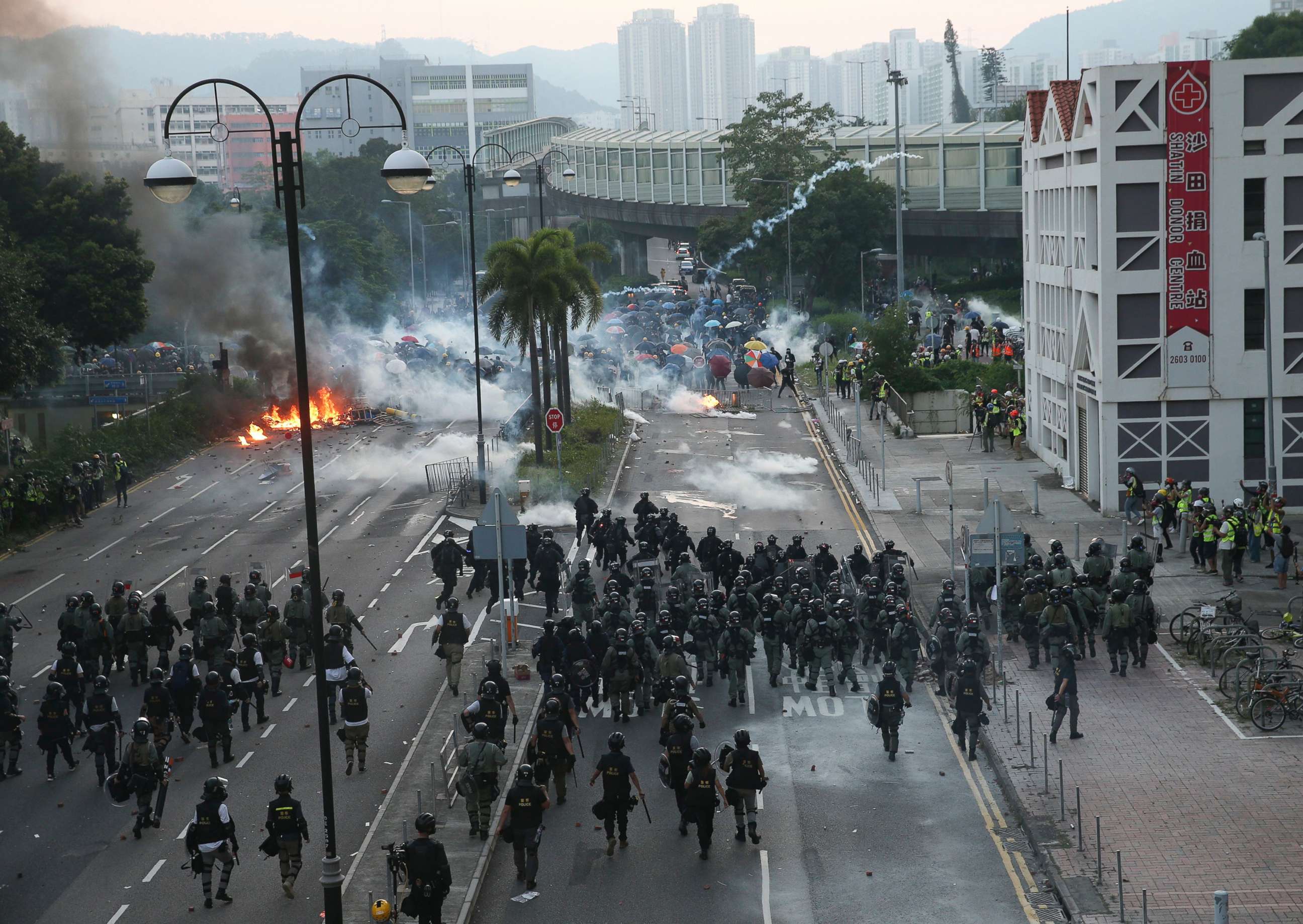 PHOTO: Police try to invade a road occupied by protesters during a protest on National Day in Hong Kong,  Oct. 1, 2019.