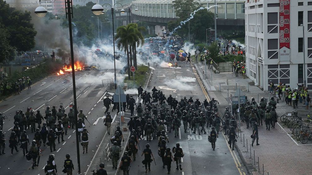 PHOTO: Police try to invade a road occupied by protesters during a protest on National Day in Hong Kong,  Oct. 1, 2019.