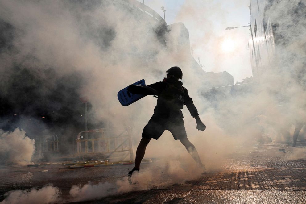 PHOTO:A protester throws an object during a demonstration on China's National Day, in Wong Tai Sin, Hong Kong, Oct. 1, 2019.