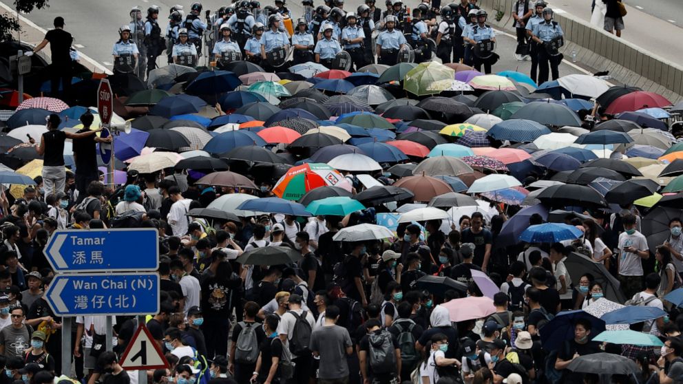 PHOTO: Protesters gather outside the Legislative Council in Hong Kong, Wednesday, June 12, 2019.