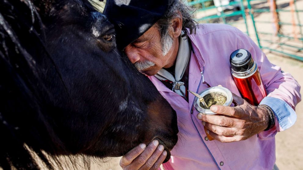 Fernando Noailles, emotional therapist, kisses his horse named Madrid in Guadalix de la Sierra, Spain, April 27, 2018.