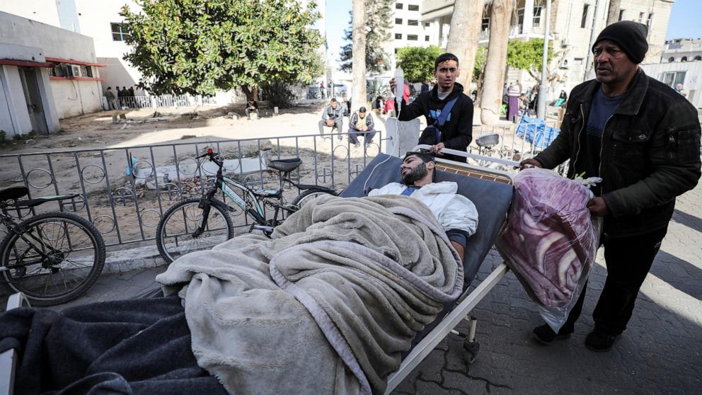 PHOTO: WoWounded Palestinians evacuated from Kamal Adwan hospital in northern Gaza, after Israeli forces raided the medical facility, arrive at Al-Ahli al-Arabi hospital, amid the ongoing conflict between Israel and Hamas, in Gaza City, Dec. 28, 2024. 