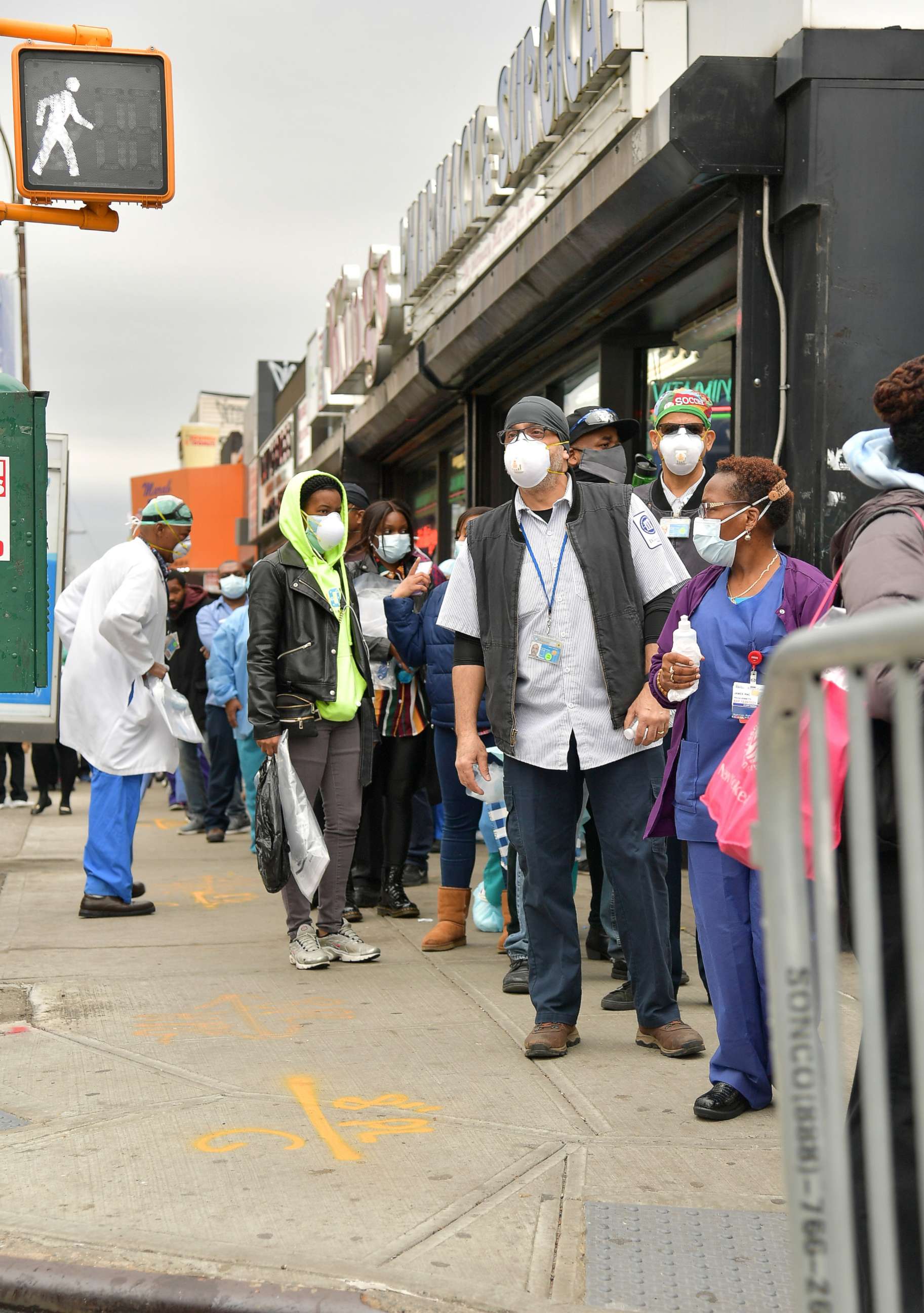PHOTO: Hospital workers line up to receive personal protective equipment and hand sanitizer at University Hospital of Brooklyn, on April 29, 2020, in Brooklyn, New York. Cut Red Tape 4 Heroes and Housing Works delivered PPE to hospital workers.