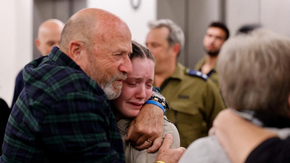 PHOTO: Agam Goldstein-Almog, 17, who was released on Nov. 26 after being taken hostage by Hamas, reacts as she is embraced by a loved one at Schneider Children's Medical Center in Petah Tikva, Israel, in this handout picture on Nov. 27, 2023.