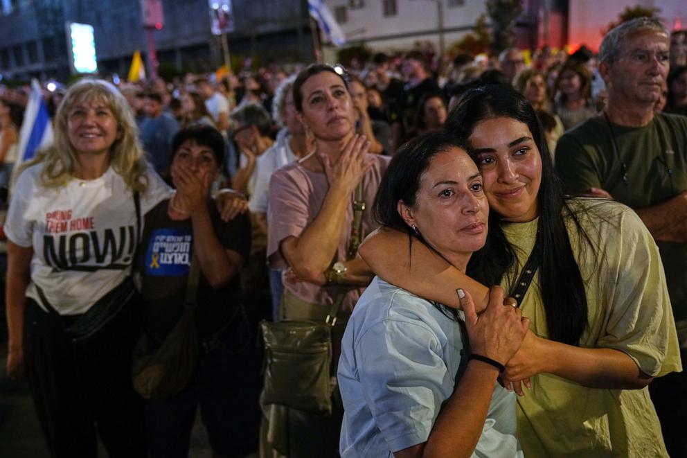 PHOTO: People listen to speeches as they take part in a rally in support of hostages kidnapped by Hamas, at a plaza known as hostages square, in Tel Aviv, Israel, Saturday, Oct. 11, 2025.