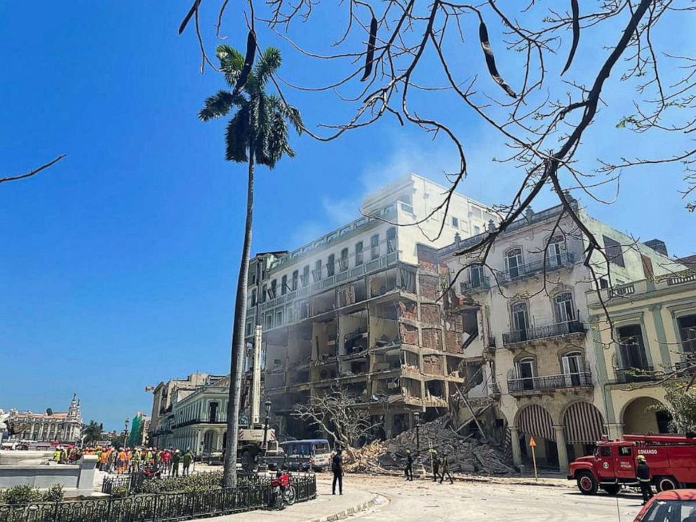 PHOTO: Rescue teams work at a site after an explosion destroyed the Hotel Saratoga, in Havana, Cuba May 6, 2022. 