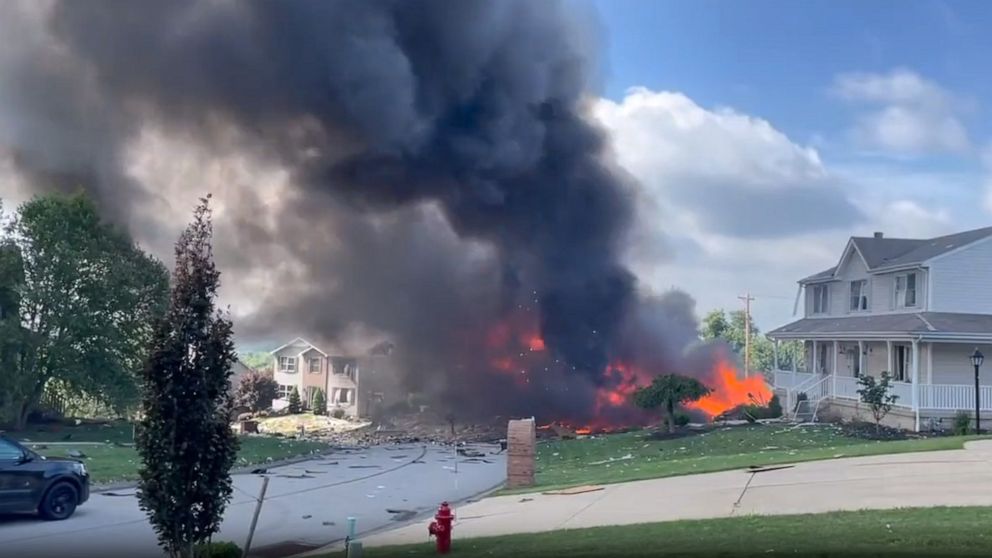 PHOTO: Fire continues to burn after a house explosion in Plum, Pa., on Aug. 12, 2023.