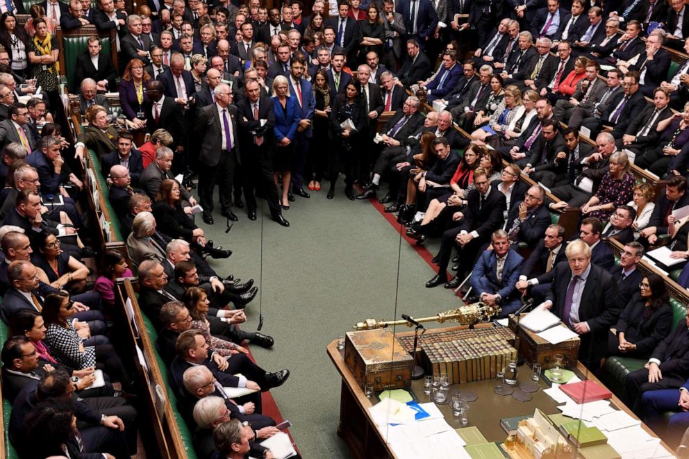 PHOTO: Members of parliament crowd the benches and the aisle while listening to Prime Minister Boris Johnson speak after the results of the vote on the Brexit Withdrawl Agreement Bill in the House of Commons in London, Oct. 22, 2019.