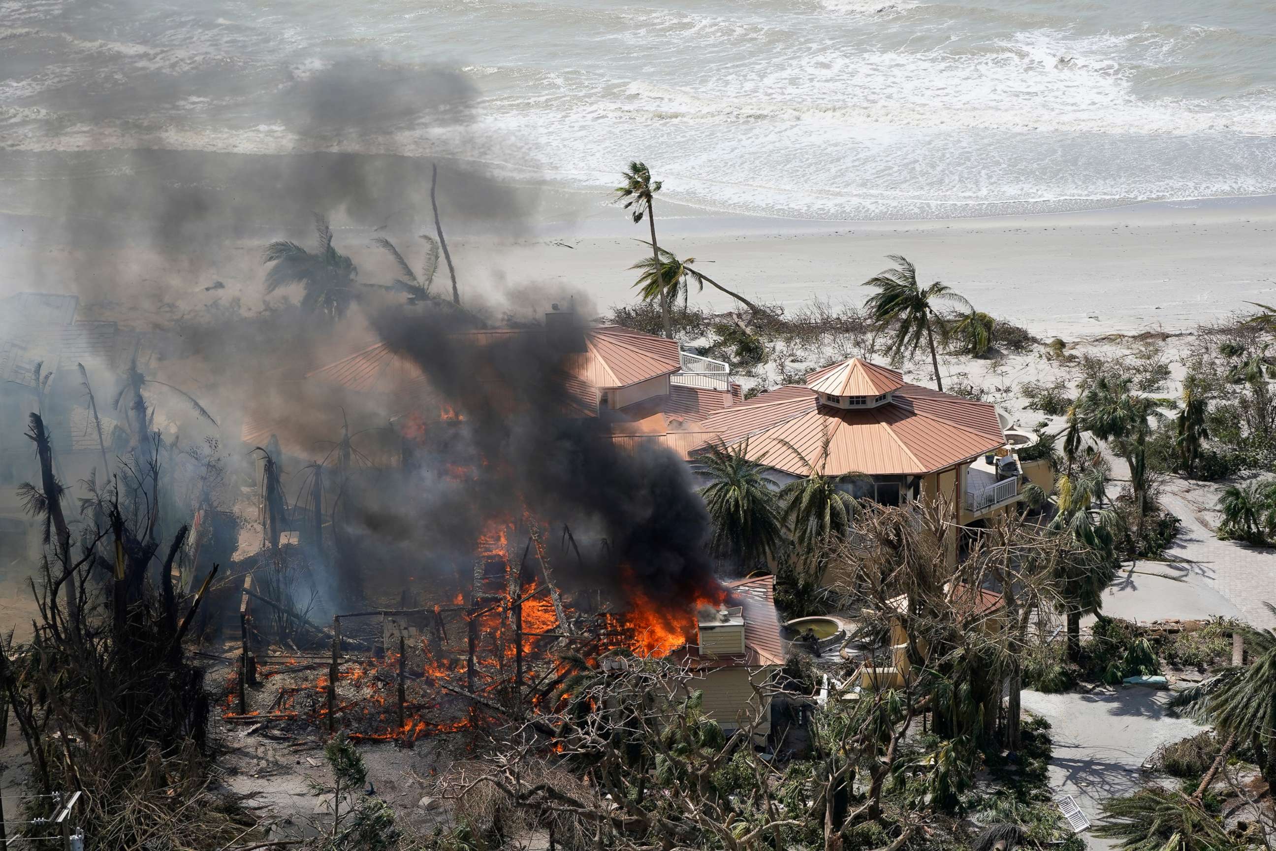PHOTO: A home burns in the wake of Hurricane Ian on Sanibel Island, Fla., Sept. 29, 2022.