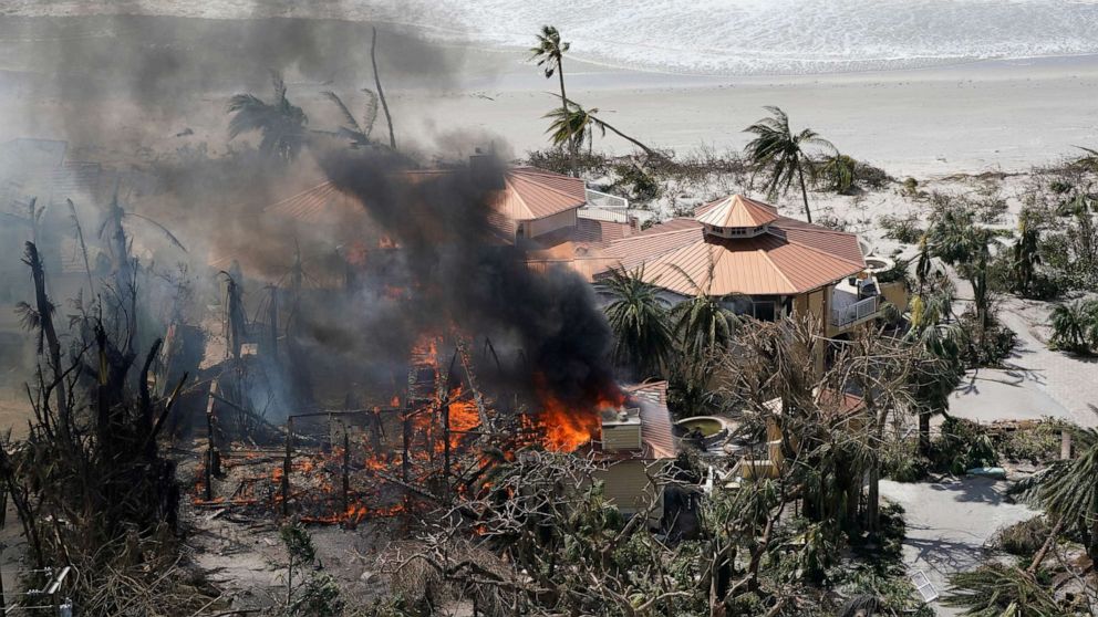 PHOTO: A home burns in the wake of Hurricane Ian on Sanibel Island, Fla., Sept. 29, 2022.