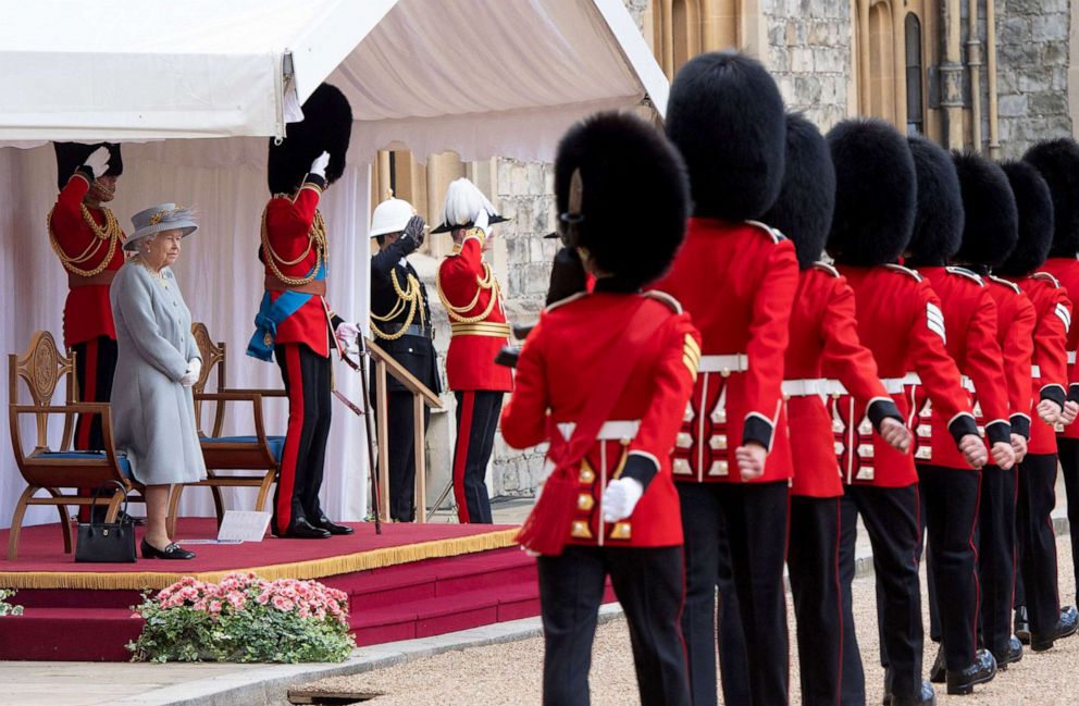 PHOTO: Queen Elizabeth II watches a military ceremony to mark her official birthday at Windsor Castle, June 12, 2021.