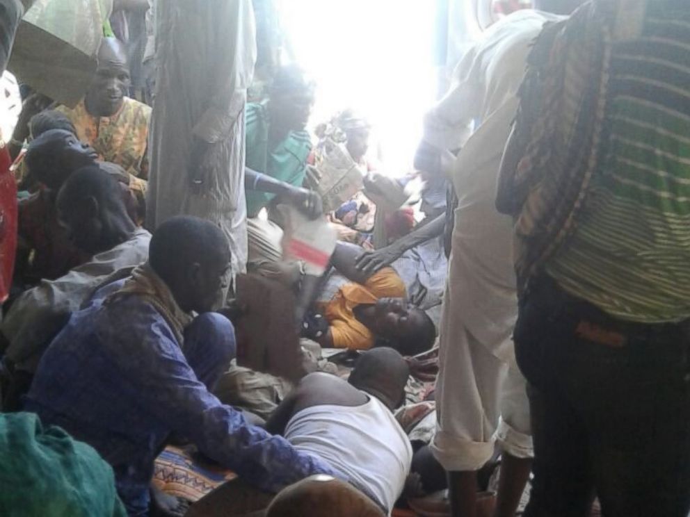 PHOTO: An image released by Doctors Without Borders shows injured people being comforted while waiting for treatment at the site of an accidental military airstrike at an internally displaced persons camp in Rann, Nigeria, Jan. 17, 2017.