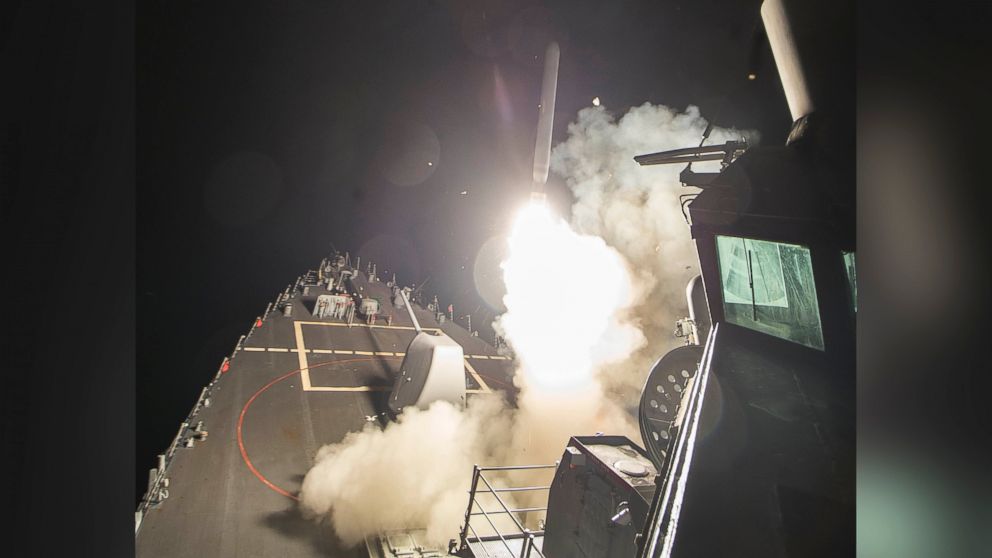 The USS Ross fires a tomahawk land attack missile at Shayrat Airfield in Syria, April 7, 2017.
