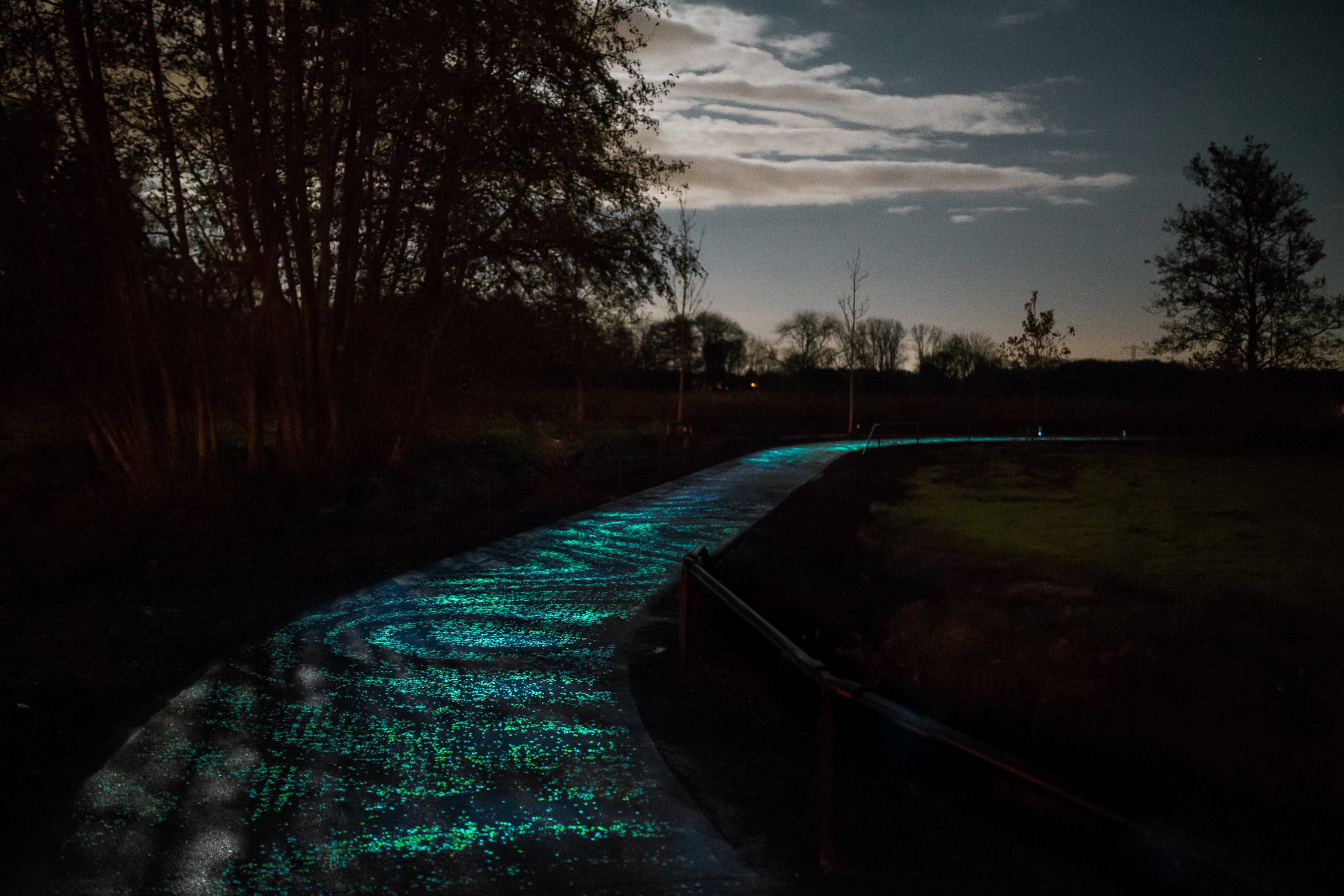 PHOTO: Artist Daan Roosegaarde's design studio in the Netherlands has made the first glow-in-the dark bike path, modeled after Van Gogh's Starry Night. 