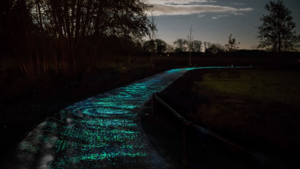 PHOTO: Artist Daan Roosegaarde's design studio in the Netherlands has made the first glow-in-the dark bike path, modeled after Van Gogh's Starry Night. 