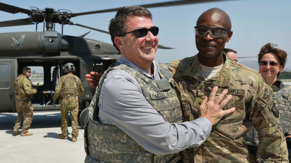 U.S. Army Brig. Gen. Ron Lewis, right, greets Deputy Secretary of Defense Ashton B. Carter, left, in Jalalabad, Afghanistan, May 13, 2013.