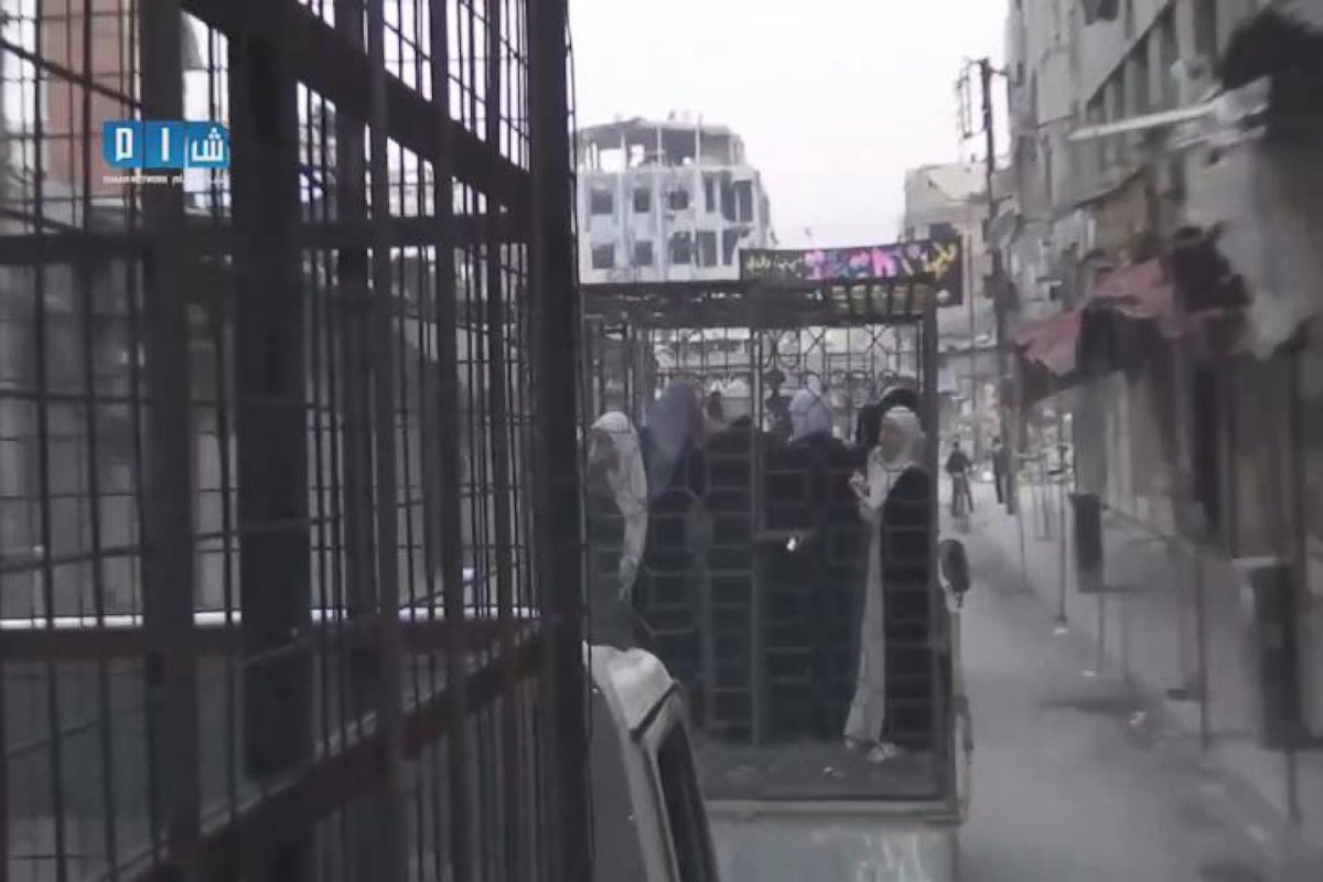 PHOTO: Still image from a video posted on November 1, 2015 showing caged civilians in Eastern Ghouta, Syria. 