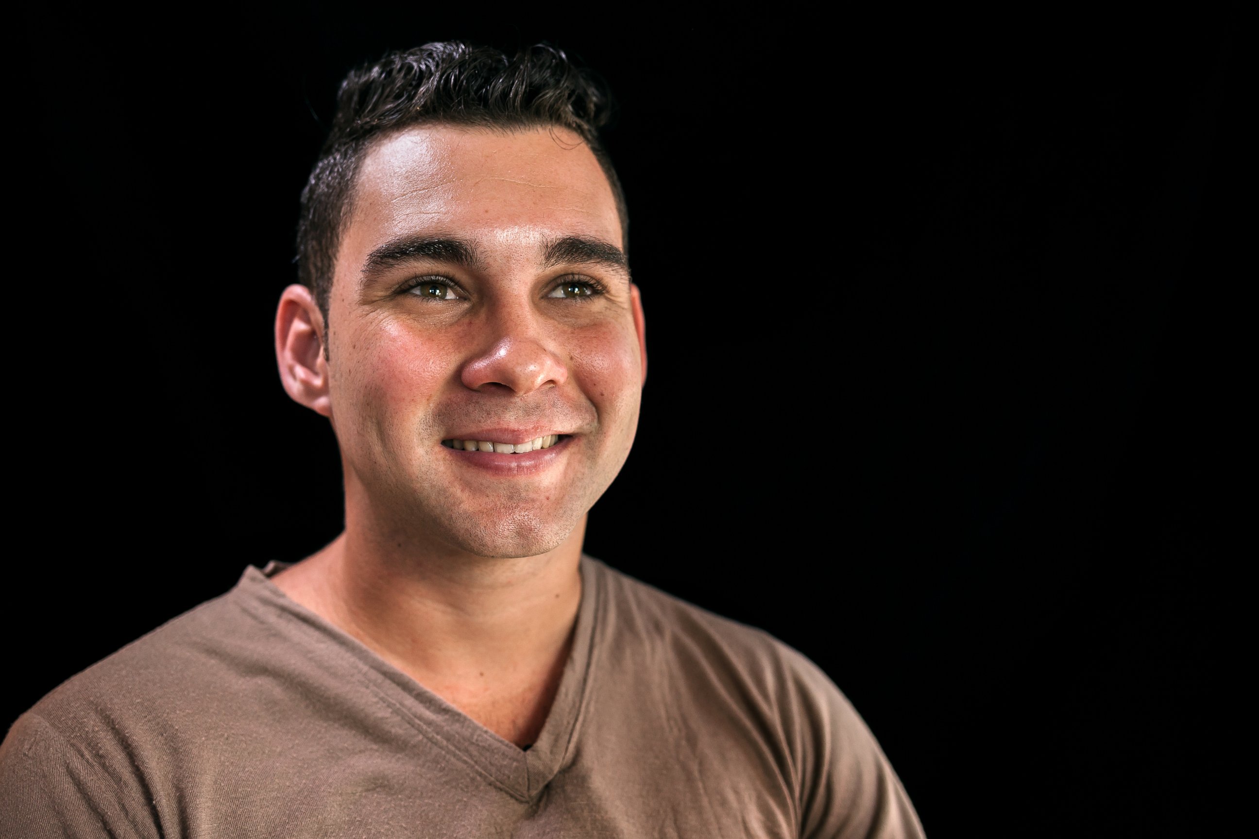 PHOTO: Elian Gonzalez smiles in a photoshoot with renowned Cuban photographer, Roberto Chile.