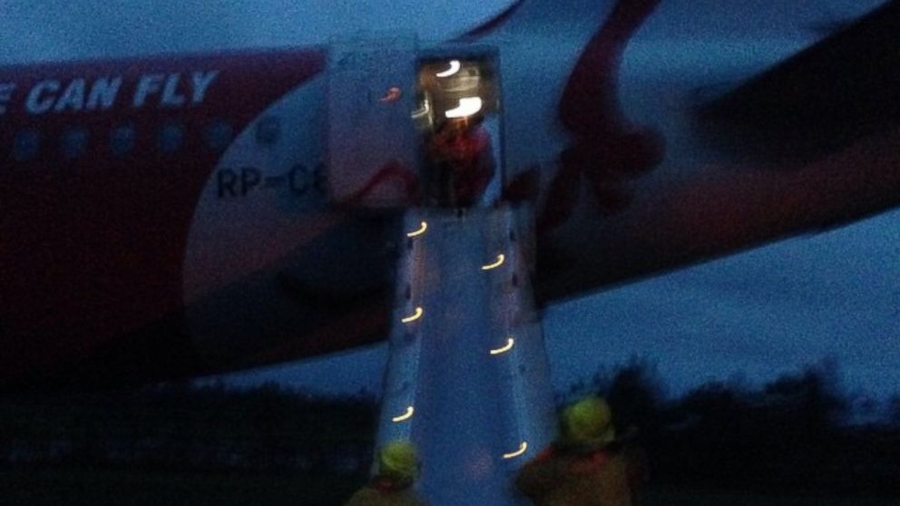 PHOTO: An AirAsia Flight Z2272 plane overshot a runway in the Philippines, Dec. 30, 2014. 
