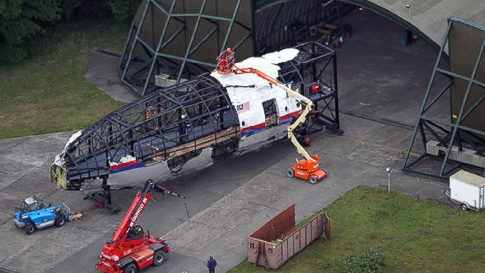 PHOTO: At the Gilze-Rijen Air Base outside of the city of Tilburg in the Netherlands, the Joint Investigation Team uses the debris from Malaysia Airlines flight MH17 to create a reconstruction of the aircraft.