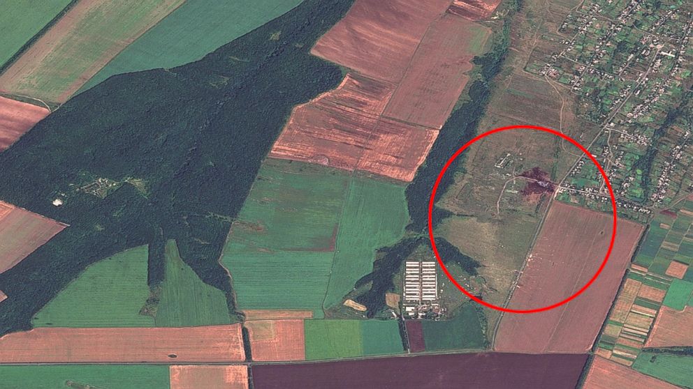 PHOTO: The crash site of Malaysia Airlines Flight 17 is circled just outside the town of Grabove, Ukraine in a satellite image from Allsource Analysis.