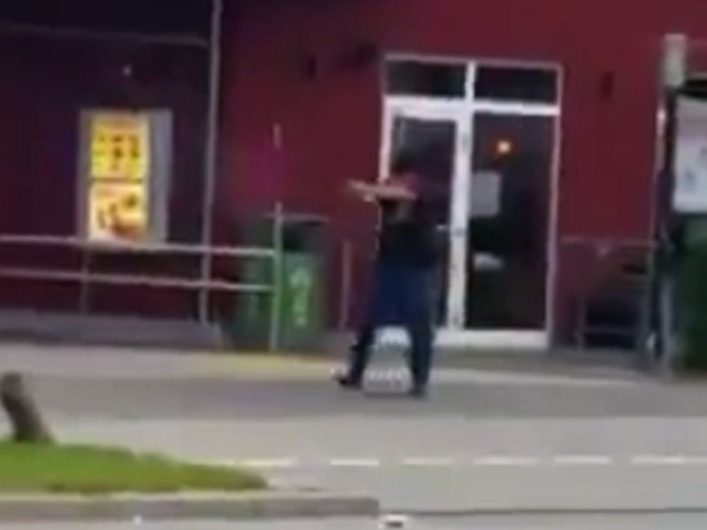 PHOTO: An image made from video posted to social media shows a gunman shooting at passersby outside a McDonalds in Munich on July 22, 2016.