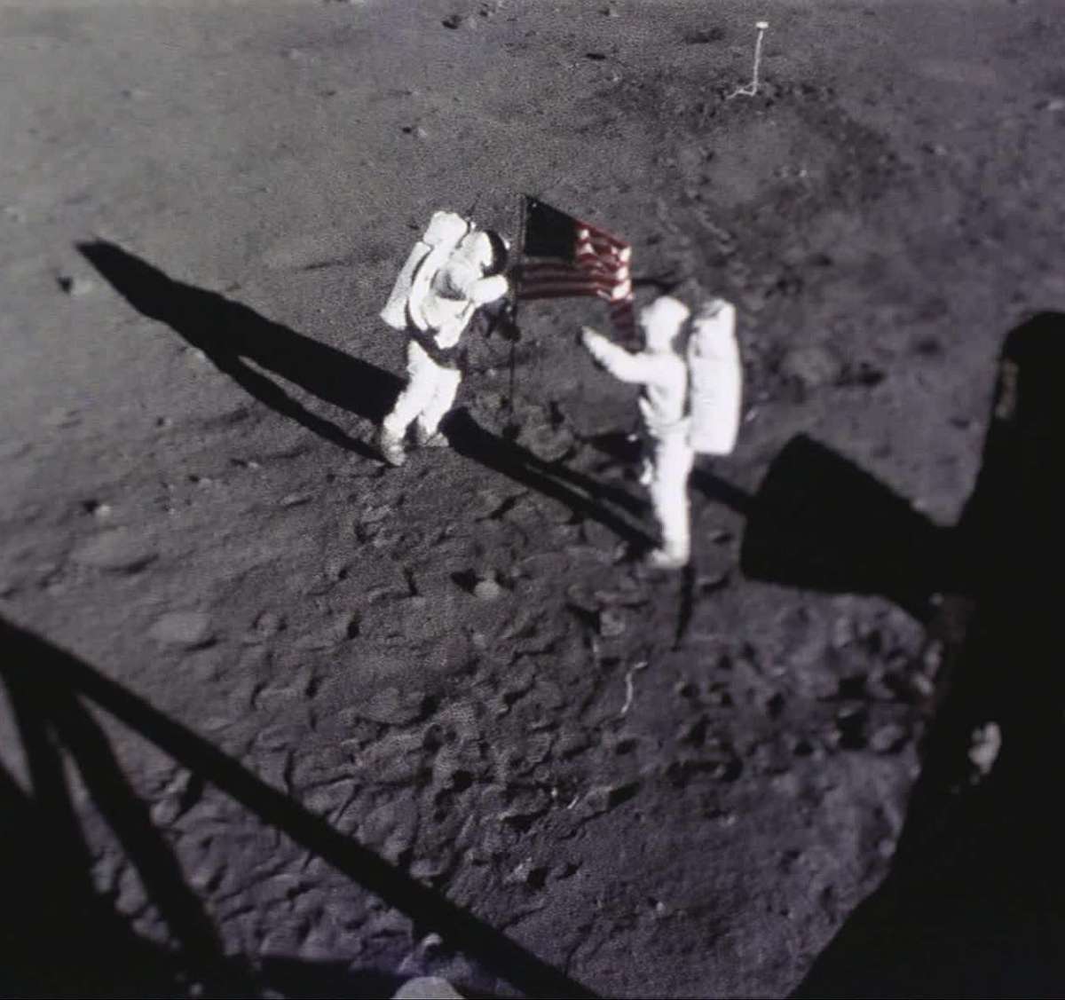 PHOTO: Astronauts Neil Armstrong and Buzz Aldrin place the American flag on the Moon, July 20, 1969. This image was captured by the Apollo 11 Data Acquisition Camera that was mounted to the lunar module Eagle.