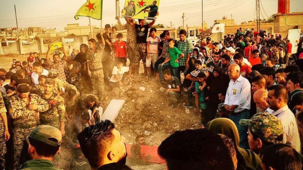 A funeral held in a community in Raqqa, Syria. 