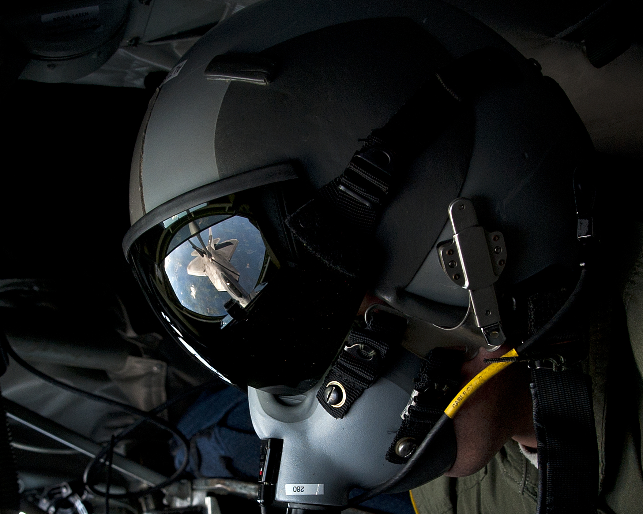 PHOTO: U.S. Air Force Tech. Sgt. Bartek Bachleda, a KC-135 Stratotanker boom operator instructor with the 54th Air Refueling Squadron at Altus Air Force Base, Okla., refuels an F-22 Raptor aircraft, Aug. 21, 2012, over New York.