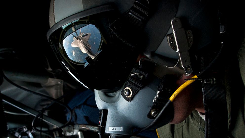 PHOTO: U.S. Air Force Tech. Sgt. Bartek Bachleda, a KC-135 Stratotanker boom operator instructor with the 54th Air Refueling Squadron at Altus Air Force Base, Okla., refuels an F-22 Raptor aircraft, Aug. 21, 2012, over New York.