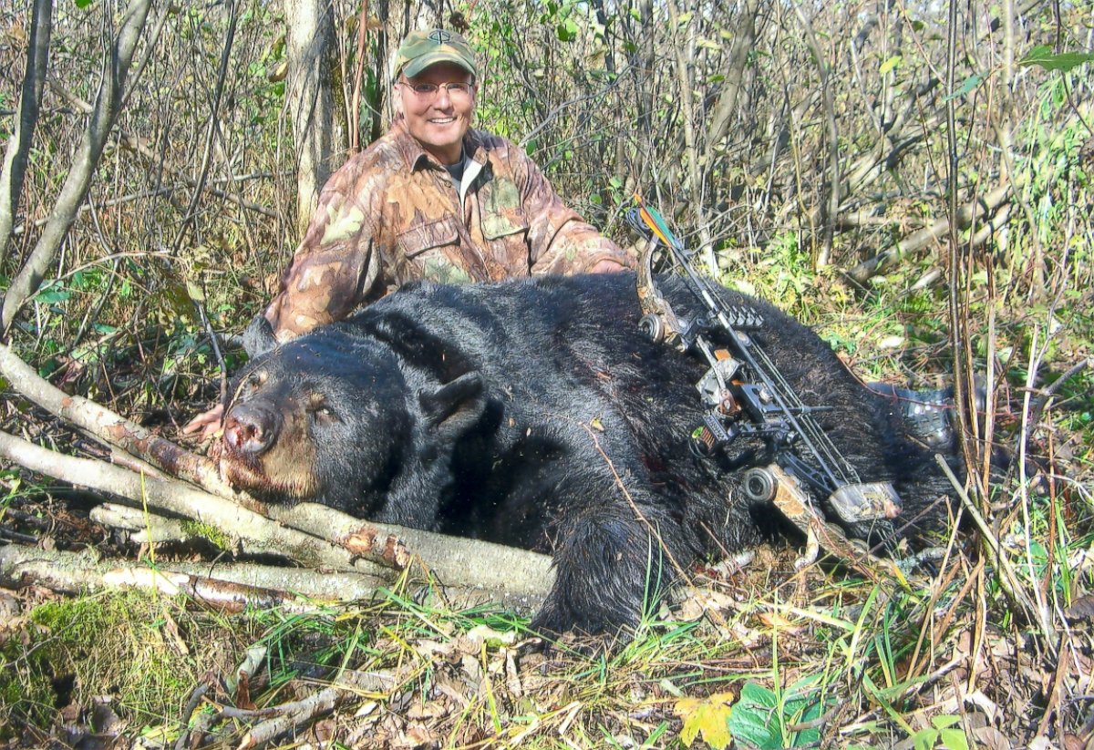 PHOTO: In 2008, Dr. Walter Palmer pleaded guilty to making false statements to the U.S. Fish and Wildlife Service about a black bear he shot and killed in Wisconsin outside of an authorized hunting zone. Palmer and the bear are pictured here.