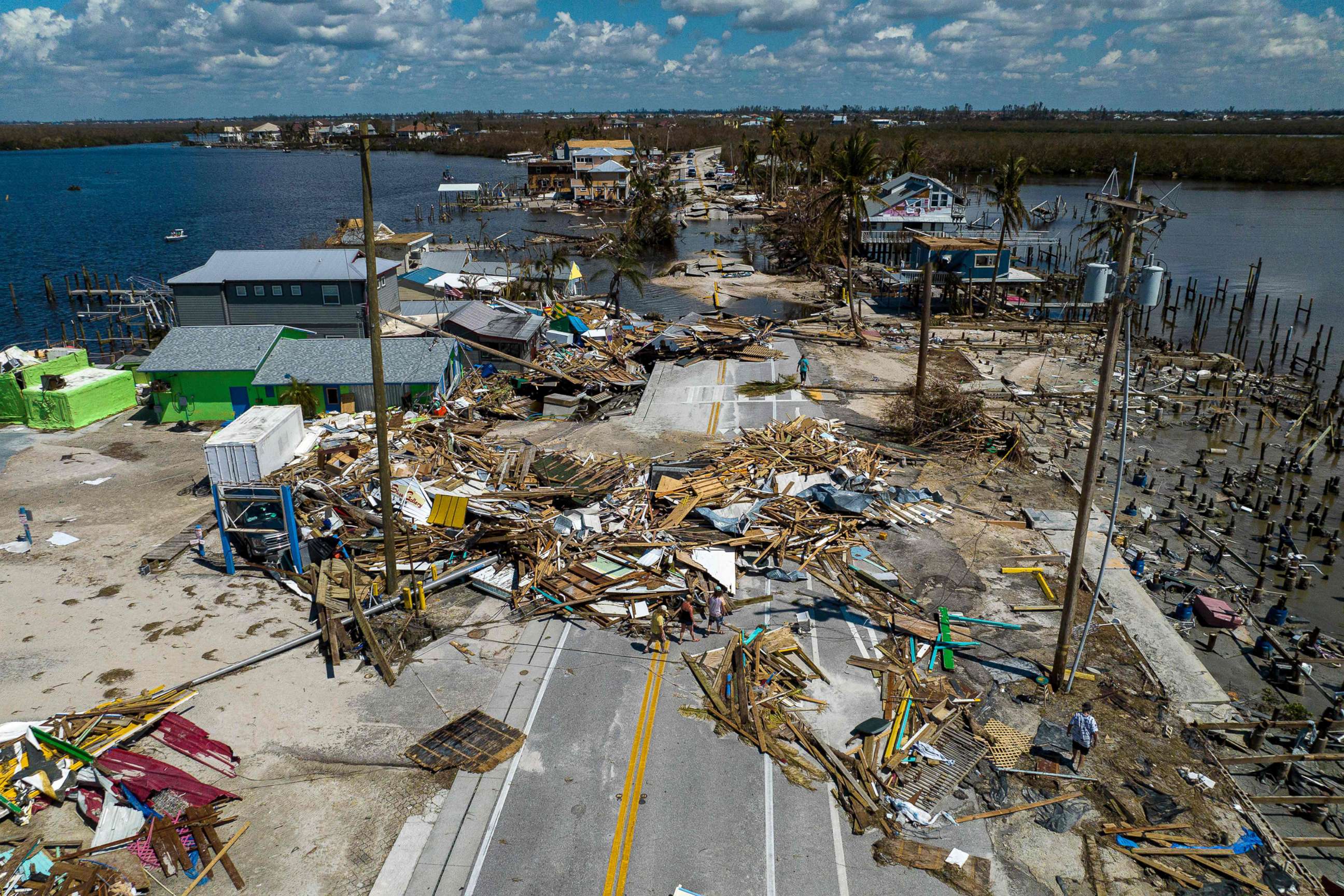 PHOTO: An aerial view shows a broken section of the Pine Island Road, debris and destroyed houses in the aftermath of Hurricane Ian in Matlacha, Fla., Oct. 1, 2022. 