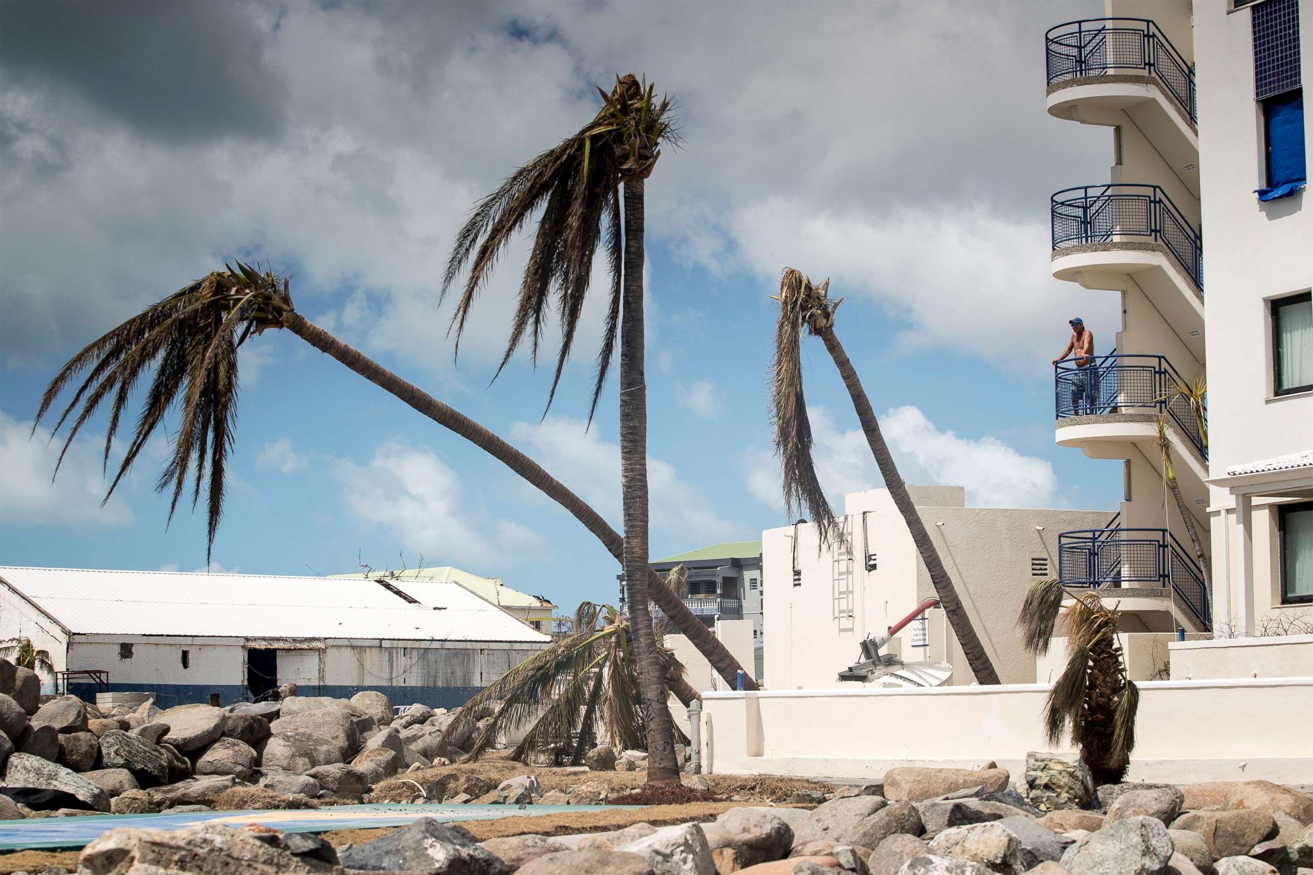 PHOTO: This handout photograph provided courtesy of the Dutch Department of Defense on Sept. 8, 2017, shows a man looking on over the devastation of Hurricane Irma on the Dutch Caribbean island of St. Martin.